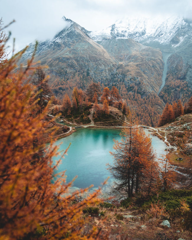the beauty of a blue lake in the middle of moutains