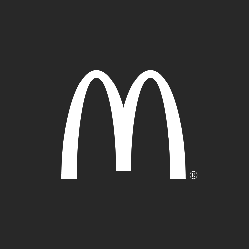Logo des arches dorées de McDonald's en blanc sur fond noir.